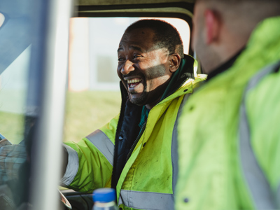 Waste Collection Workers In Lorry